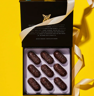 Fruition Chocolate Works Brown Butter Bourbon Caramels, a nine-piece box of handcrafted bourbon-infused caramels coated in 68% Dominican dark chocolate, available at Chocology Unlimited.